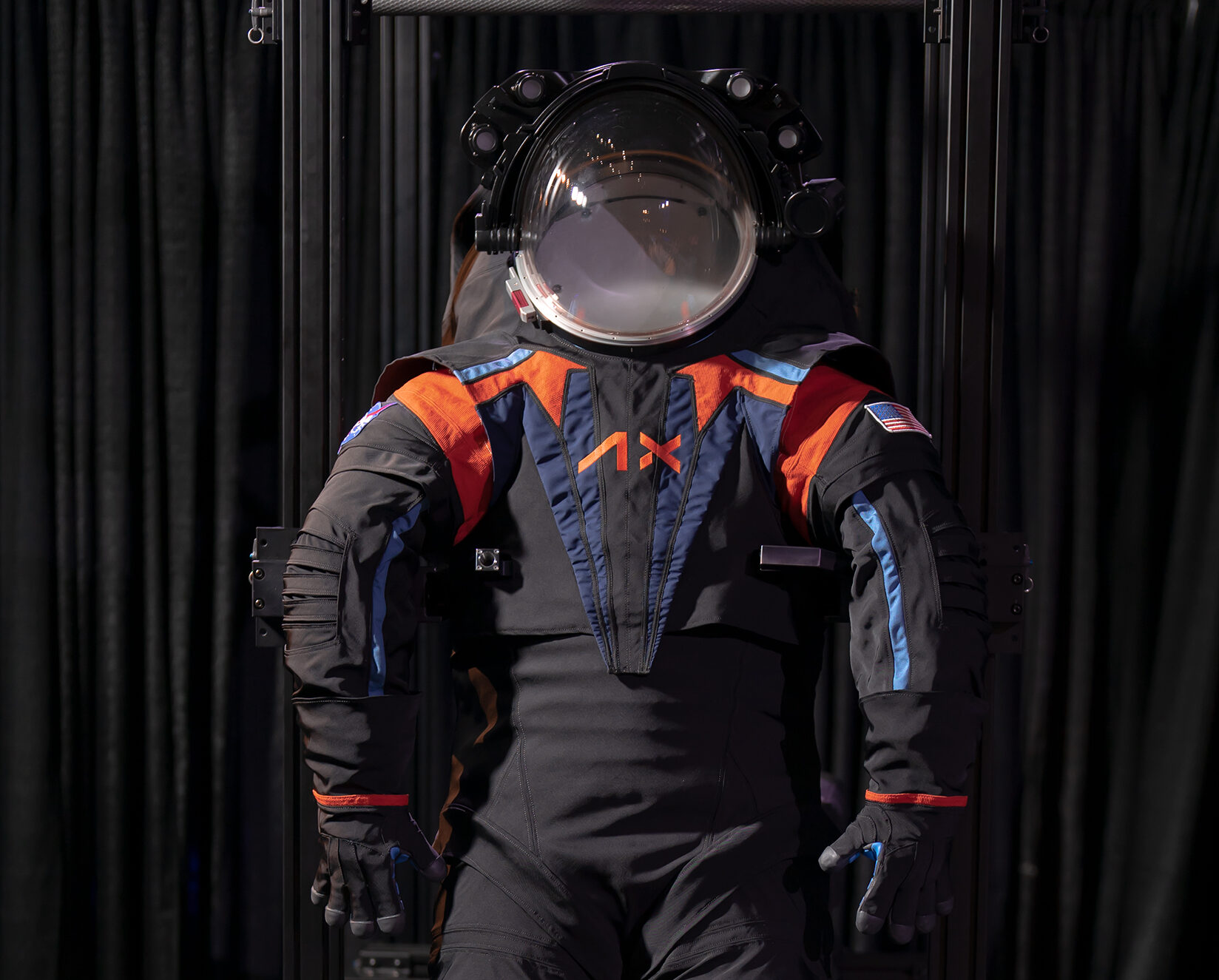 What will Axiom and Collins suits look like and how much will they cost to go to the Moon